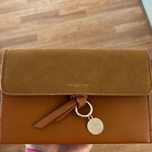 Crossbody bag. It’s used.